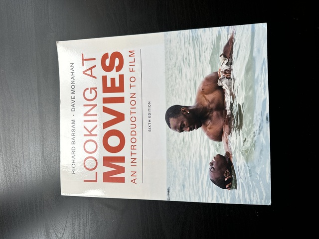 9780393674699-Looking-at-Movies