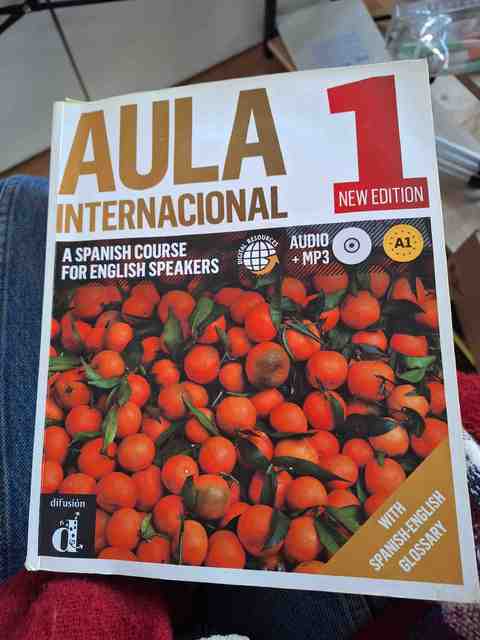 9788415846772-Aula-Internacional-1-Libro-del-alumno-CD-Version-Inglesa
